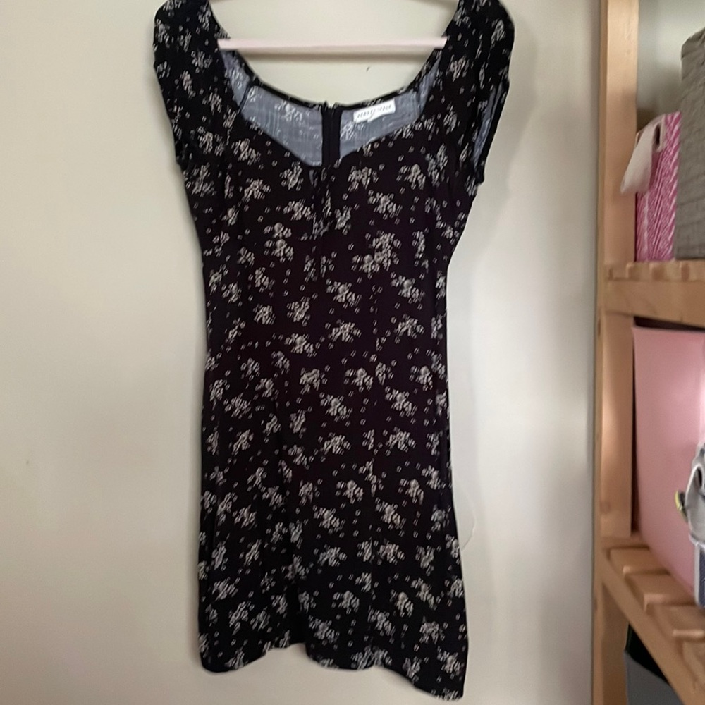 Women black dress with tan flowers size small